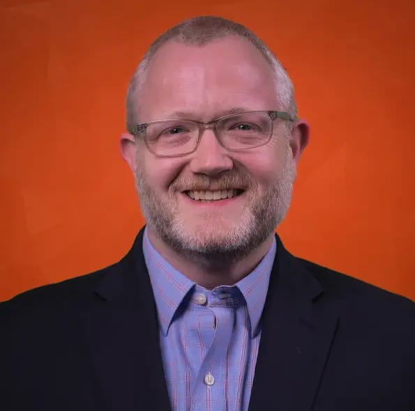 Vision care, Dress shirt, Forehead, Glasses, Smile, Beard, Tie, Gesture, Collar, Happy