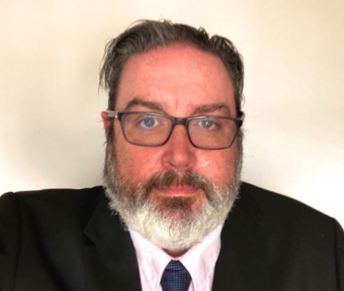 Vision care, Dress shirt, Forehead, Nose, Glasses, Beard, Jaw, Tie, Collar, Ear
