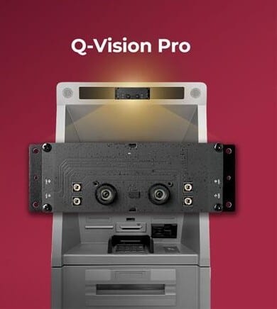 Black Q-Vision Pro device with dual cameras mounted on an ATM.