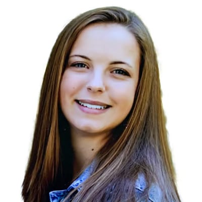 Smiling woman with long brown hair.