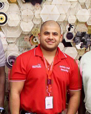Social group, Smile, Hairstyle, Muscle, Human, T-shirt, Eyewear, Cool, Red