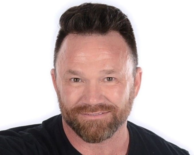 Clothing, Nose, Cheek, Smile, Shirt, Beard, Eyelash, Jaw, Neck, Iris