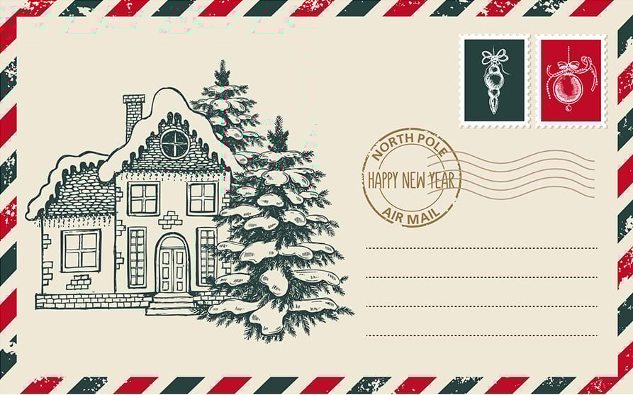 Vintage Christmas envelope with snowy house, pine trees, ornament stamps, and a North Pole postmark.