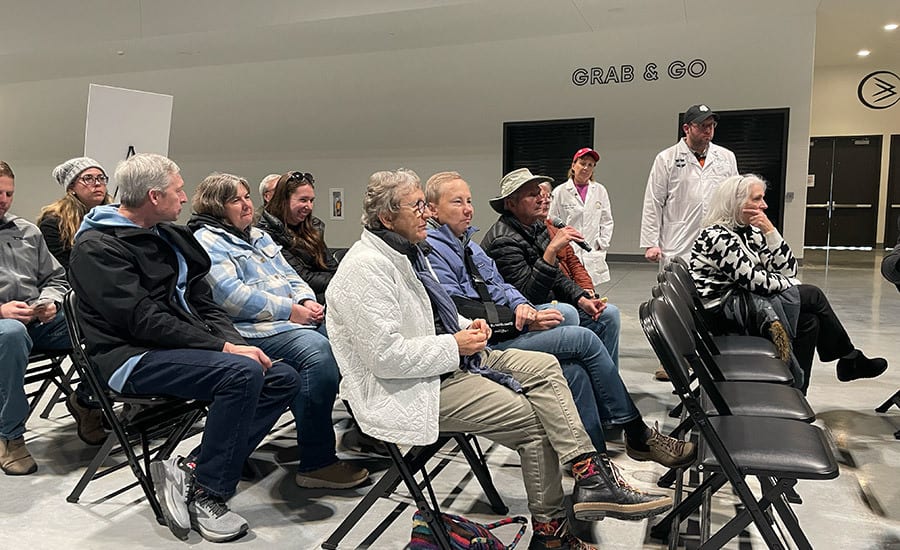 Shoe, Footwear, Furniture, Trousers, Jeans, Leg, Chair, Sitting, Sneakers, Audience
