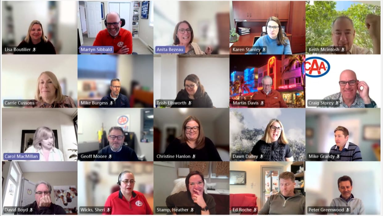 A group video call featuring 20 participants with their names visible, engaged in an online meeting.