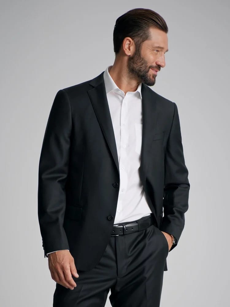 Suit trousers, Dress shirt, Outerwear, Coat, Beard, Neck, Sleeve, Standing, Gesture, Grey