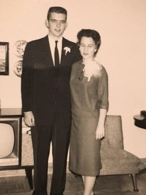 Suit trousers, Picture frame, Smile, Gesture, Collar