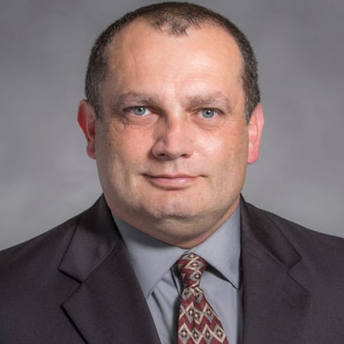 Dress shirt, Forehead, Chin, Eyebrow, Organ, Tie, Gesture, Collar, Suit