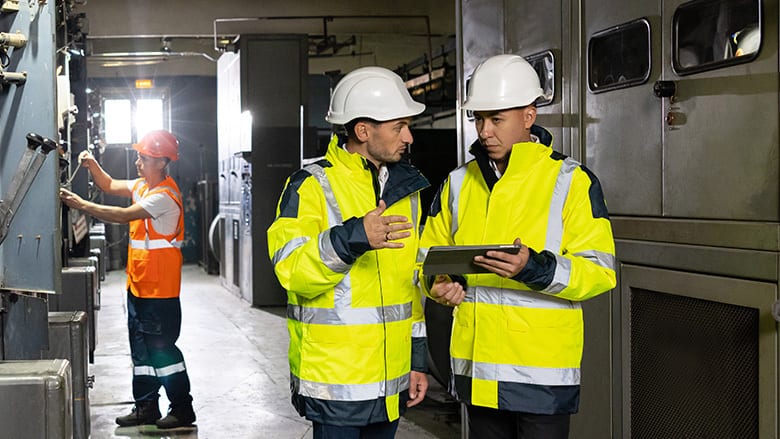 Hard hat, High-visibility clothing, Blue-collar worker, Helmet, Workwear, Engineer, Sleeve, Yellow, Headgear, Tradesman