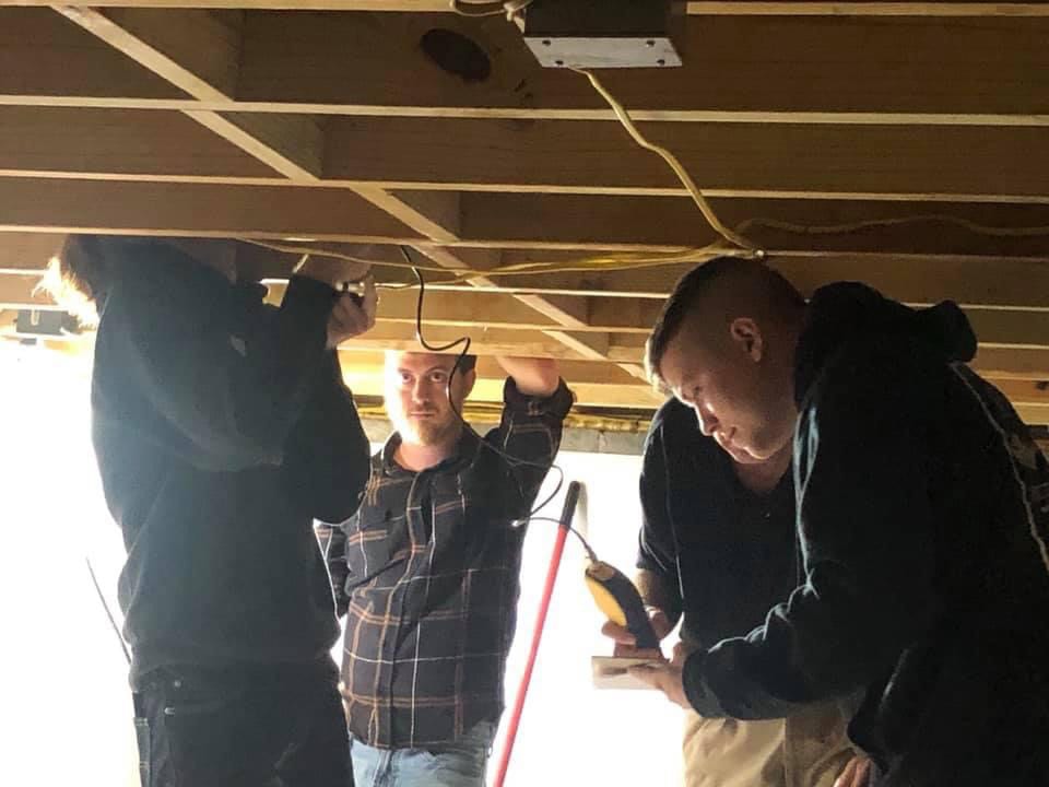Students In Crawl Space