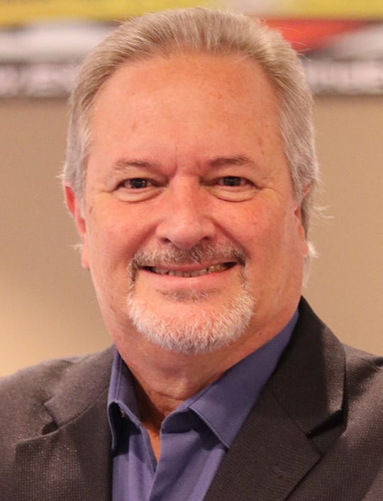 Dress shirt, Clothing, Forehead, Nose, Cheek, Smile, Skin, Chin, Eyebrow, Beard