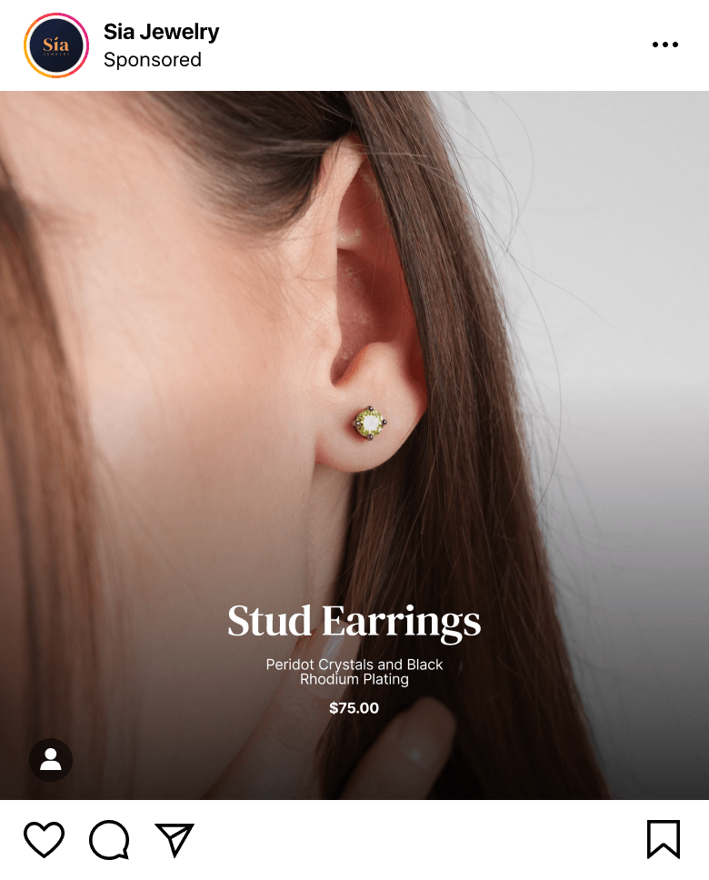 Woman wearing a peridot crystal and black rhodium plated stud earring.