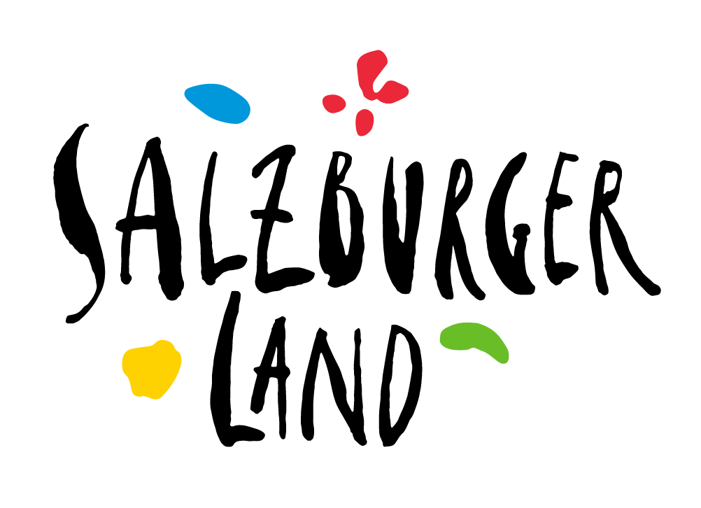 Stylized logo for SalzburgerLand with black handwritten text and colorful organic shapes on a green background.