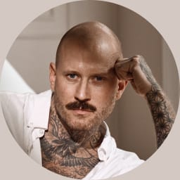 Facial expression, Forehead, Nose, Hairstyle, Eyebrow, Mouth, Beard, Neck, Jaw, Ear