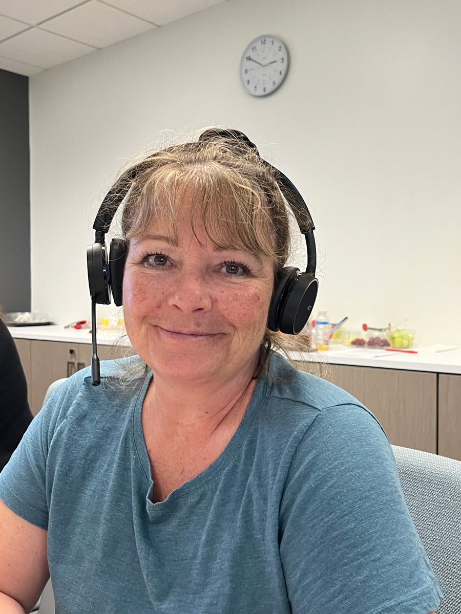 an image of a female wearing a headset