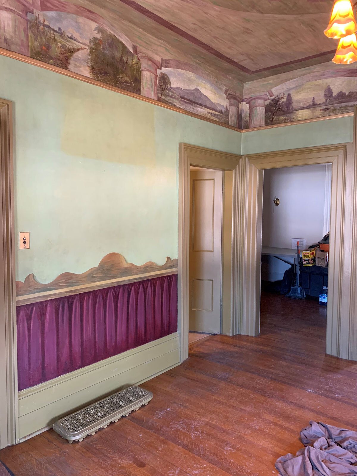 an image of the hallway prior to restoration