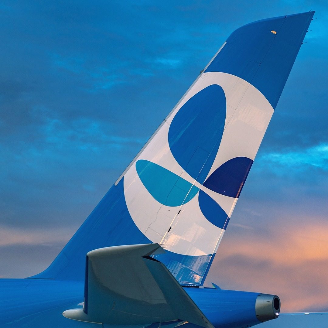 Air travel, Sky, Cloud, Blue, Azure, Aviation, Fin, Flap