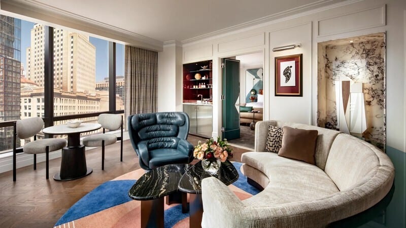 Picture frame, Living room, Interior design, studio couch, Table, Furniture, Property, Building, Comfort
