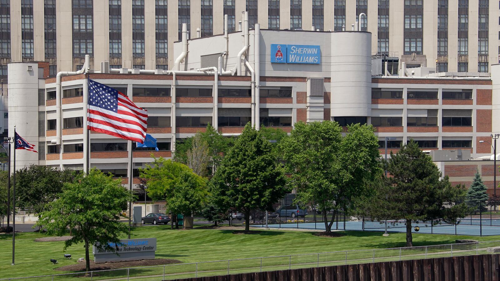 Flag of the united states, Urban design, Public space, Plant, Daytime, Property, Building, Infrastructure, Tree