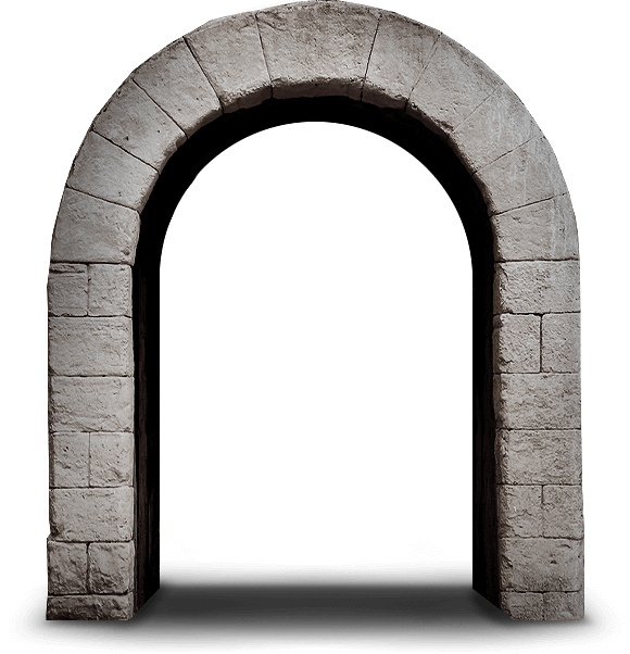 A standalone stone archway made of light-colored blocks, casting a subtle shadow below.