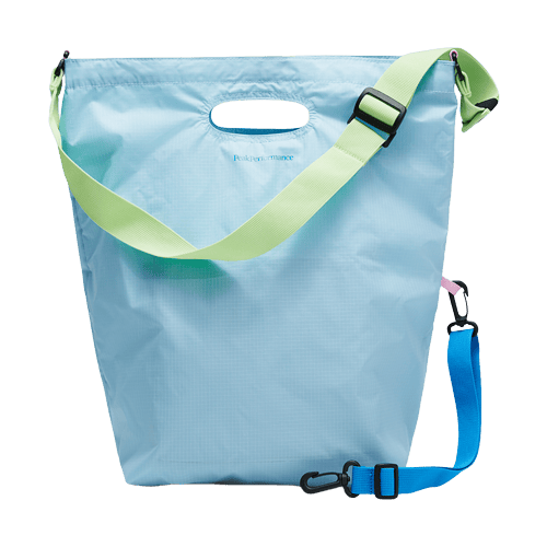 Blue Peak Performance tote bag with colorful straps and carabiner.