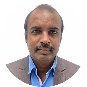 Dark-skinned man with mustache in headshot.