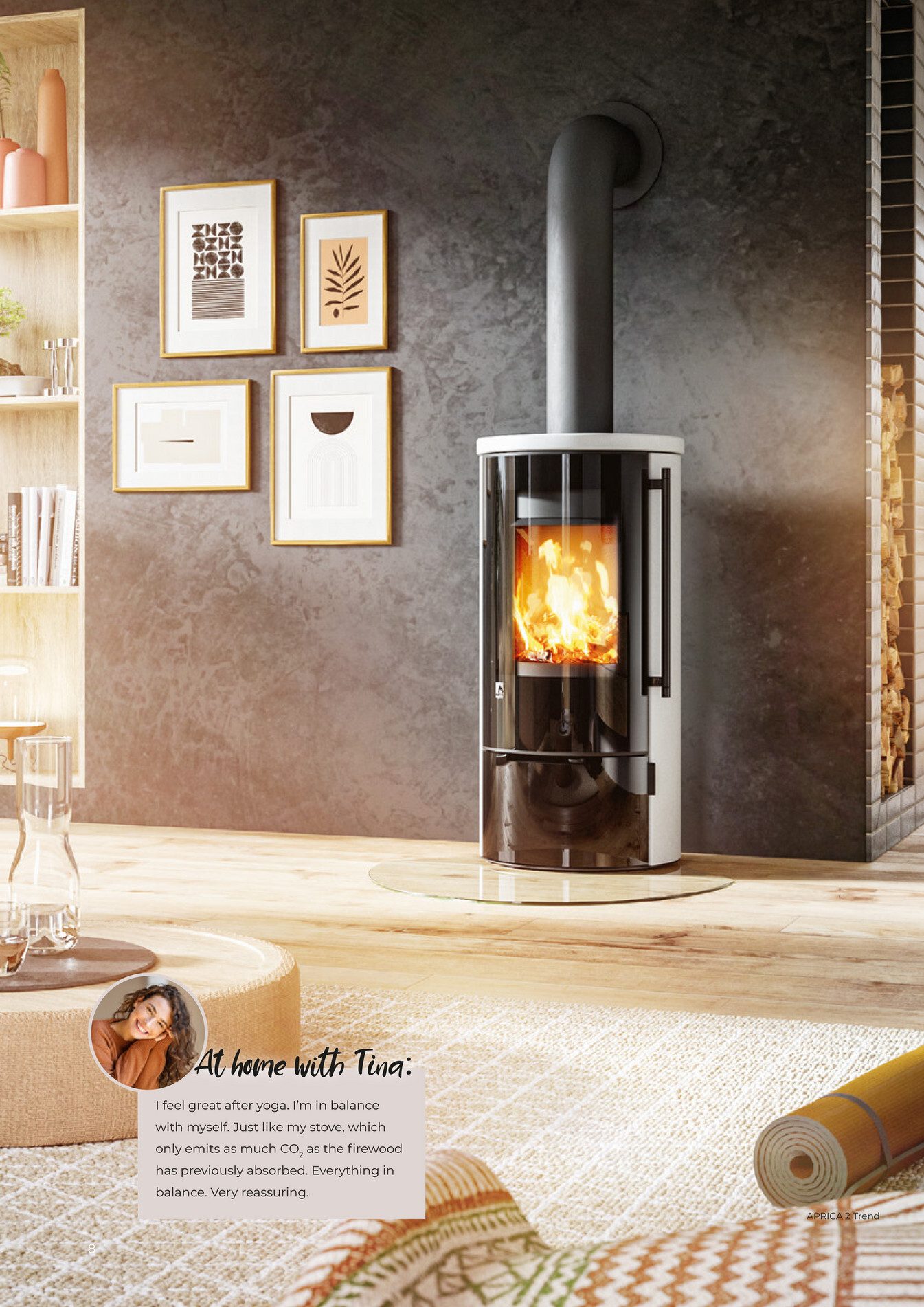 Modern living room with a wood stove, abstract art, and yoga mat. Tina's quote on balance.