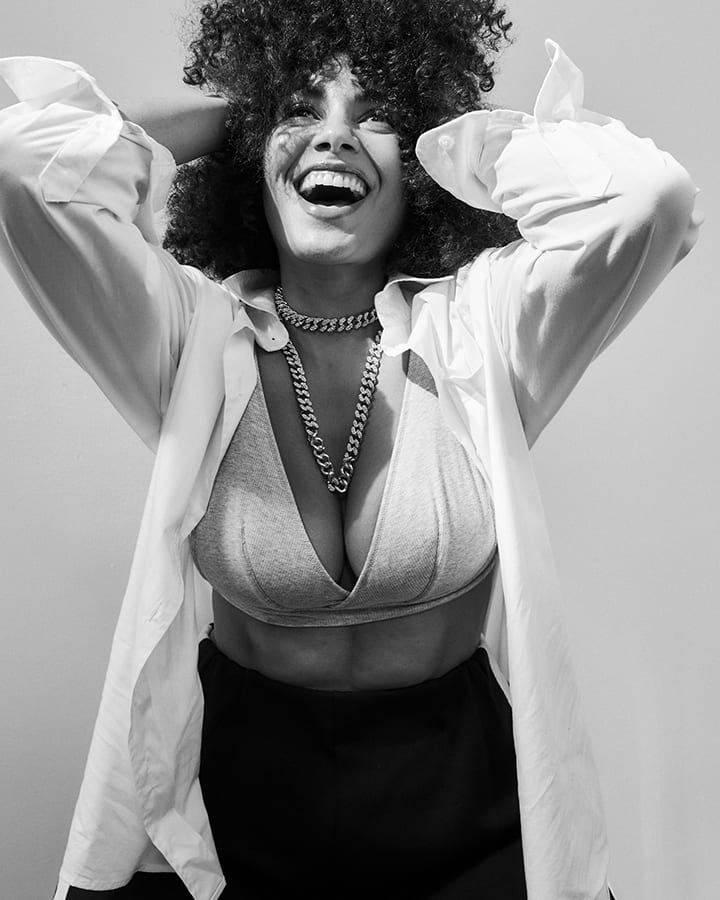 Flash photography, Smile, White, Black, Sleeve, Gesture, Black-and-white, Style, Happy, Eyewear