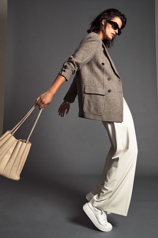 Vision care, Trench coat, Shoe, Outerwear, Overcoat, Sunglasses, Sleeve, Waist, Bag, Eyewear