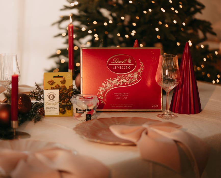 Christmas tree, Interior design, Drinkware, Decoration, Tableware, Light, Table, Branch