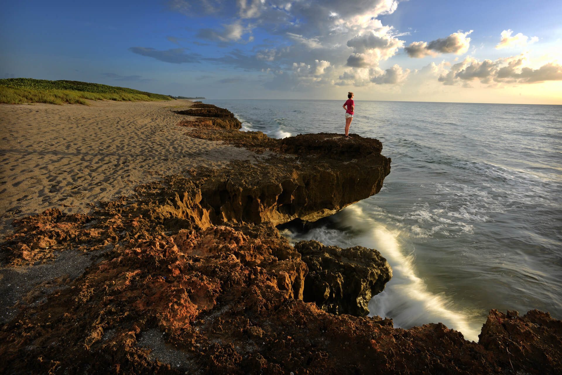 Coastal and oceanic landforms, Body of water, Natural environment, Cloud, Sky, Azure, Sunlight, Terrain