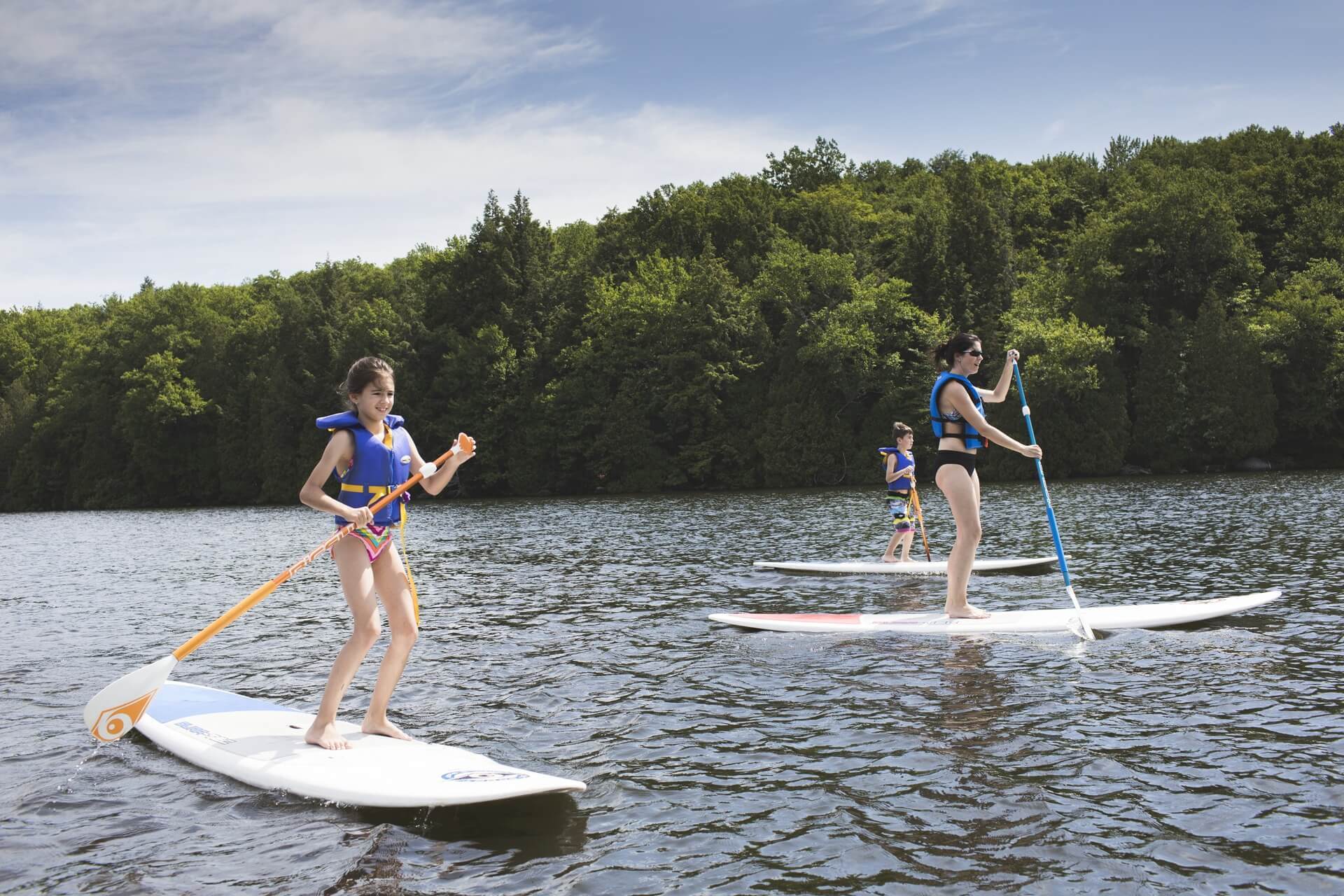 Sports equipment, Outdoor recreation, Water, Sky, Cloud, Surfing, Surfboard, Tree, Lake