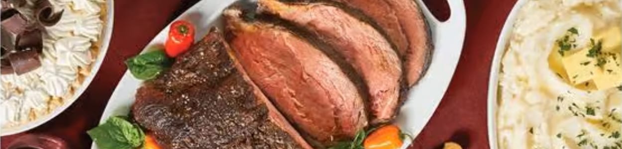 Sliced roast beef, mashed potatoes with butter, and a chocolate cream pie.