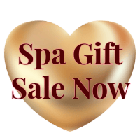 A golden heart shape with the text "Spa Gift Sale Now" in dark red, set against a dark green background.