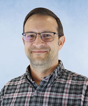 Vision care, Dress shirt, Forehead, Glasses, Cheek, Smile, Chin, Eyebrow, Eye