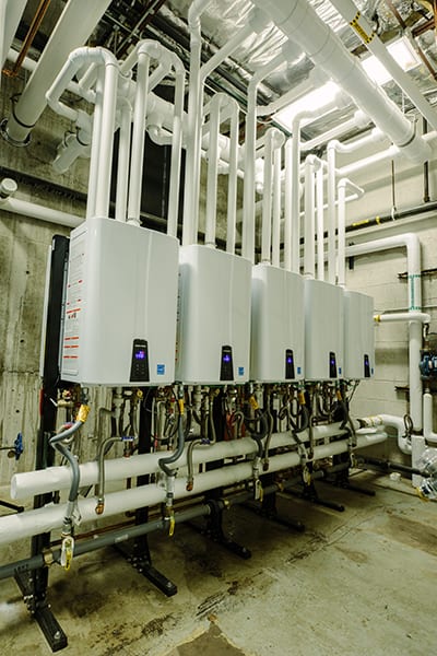 Tankless Water Heaters Constructed With Navien Ready Link Racks And Manifold Systems