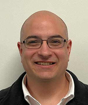 Vision care, Forehead, Glasses, Chin, Smile, Eyebrow, Eyewear, Jaw, Collar