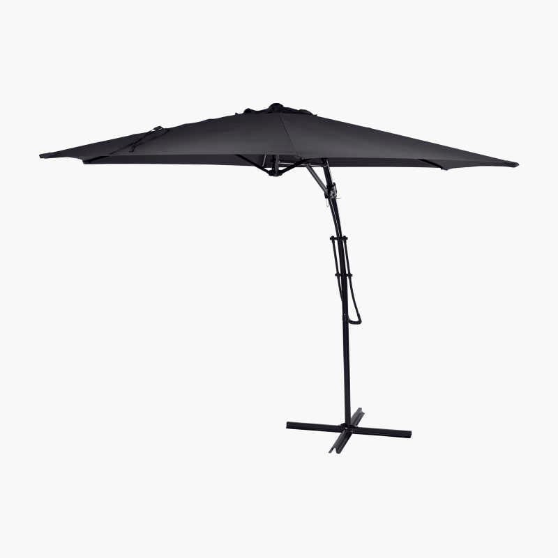 A black cantilever outdoor umbrella with a cross base.