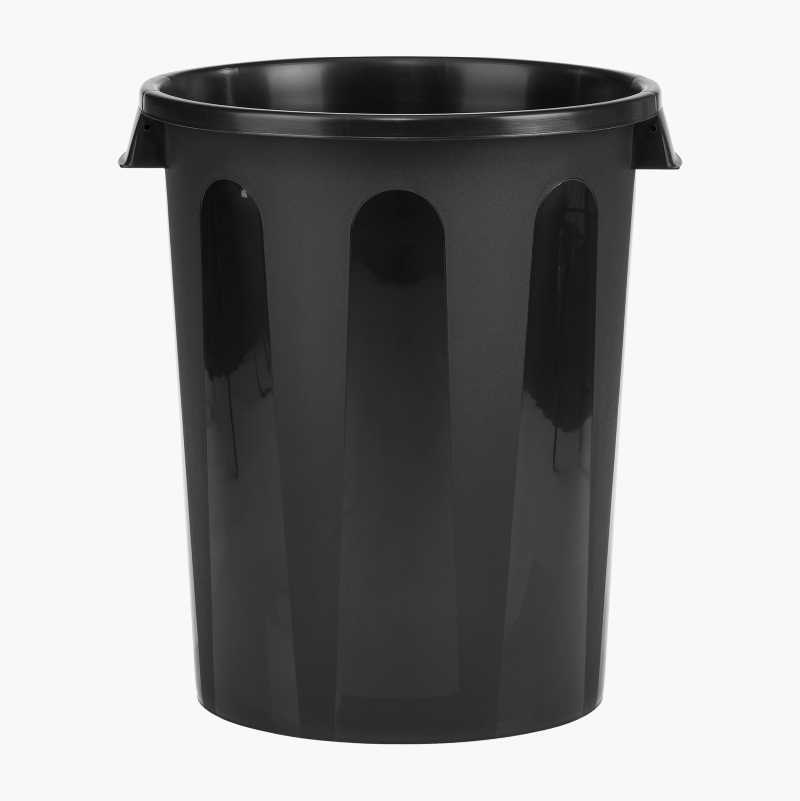 Glossy black plastic wastebasket with vertical ribs.