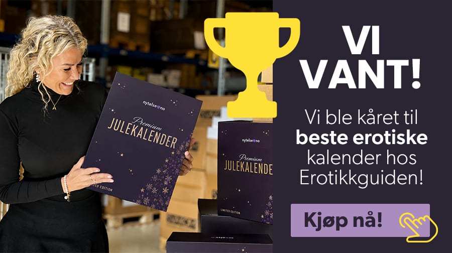 A smiling woman holds an award-winning adult advent calendar in a warehouse, with text announcing the win.
