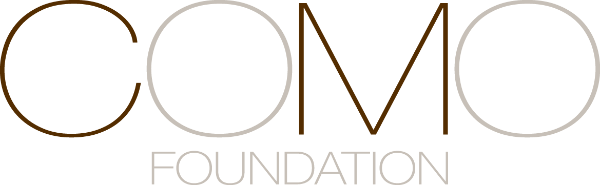 COMO FOUNDATION logo featuring "COMO" in large, stylized letters and "FOUNDATION" below it.