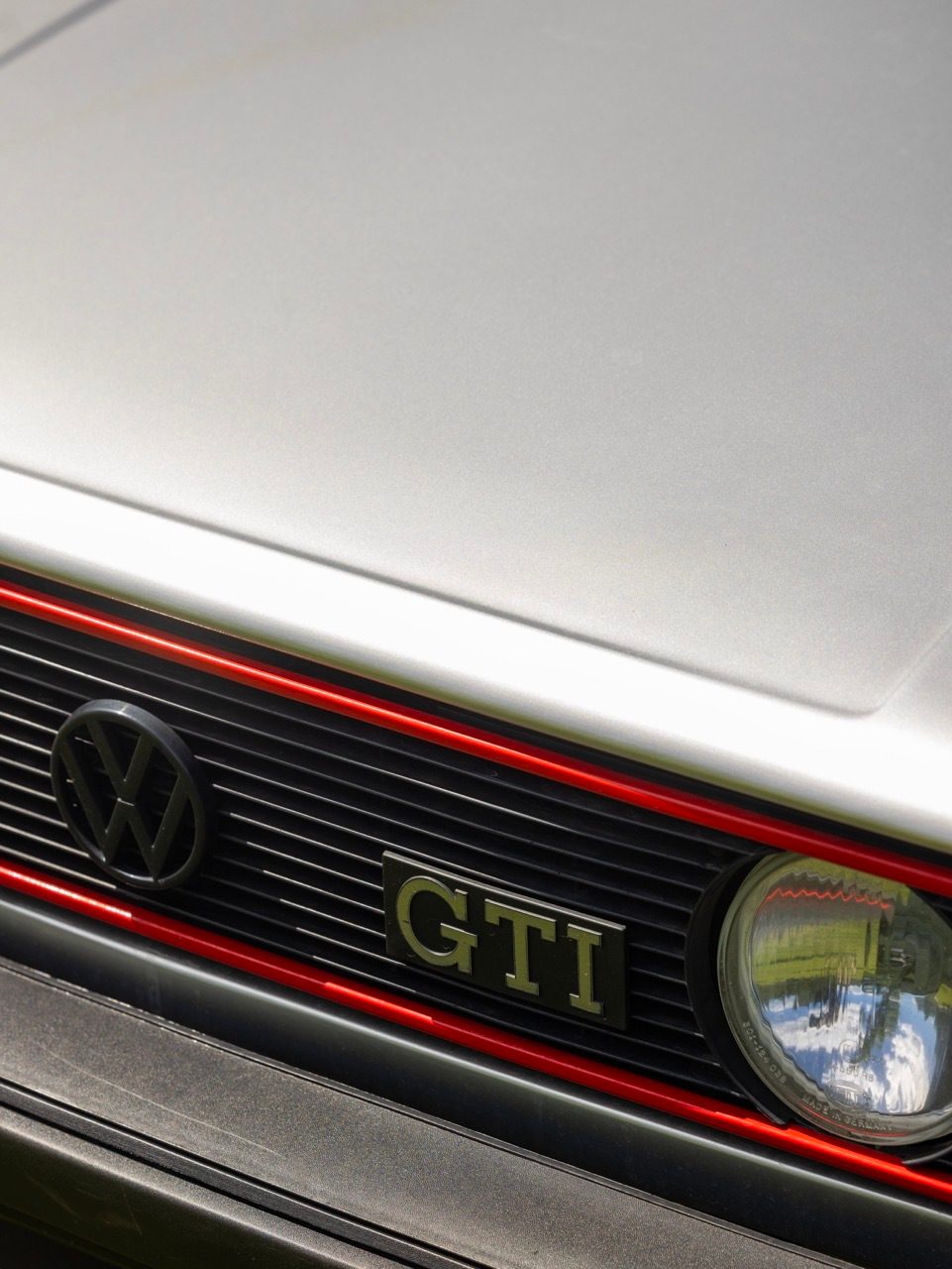 Personal luxury car, Automotive lighting, Motor vehicle, Grille, Hood, Bumper