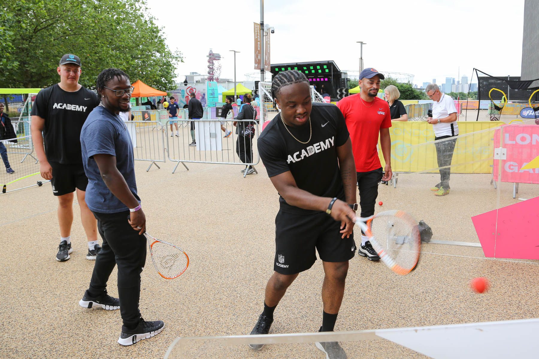 Black man plays squash