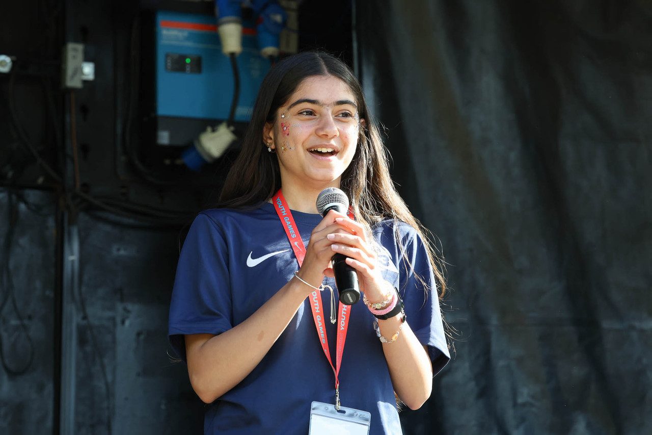 Girl with microphone speaking