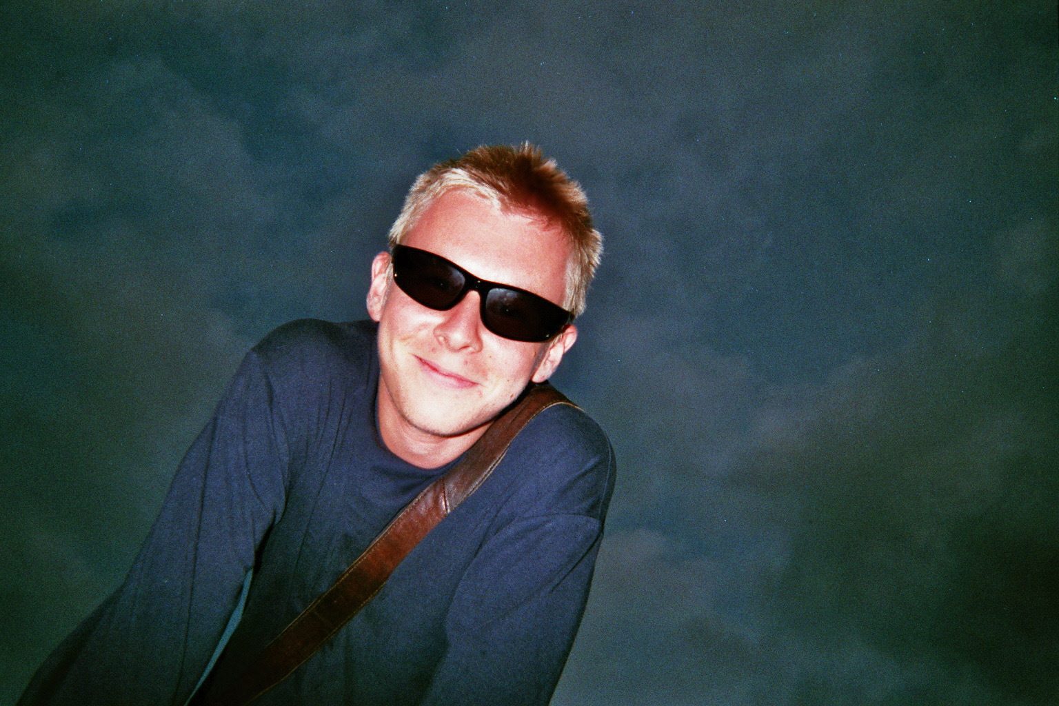 Vision care, Flash photography, Glasses, Smile, Eyebrow, Sunglasses, Goggles, Eyewear, Jaw, Neck