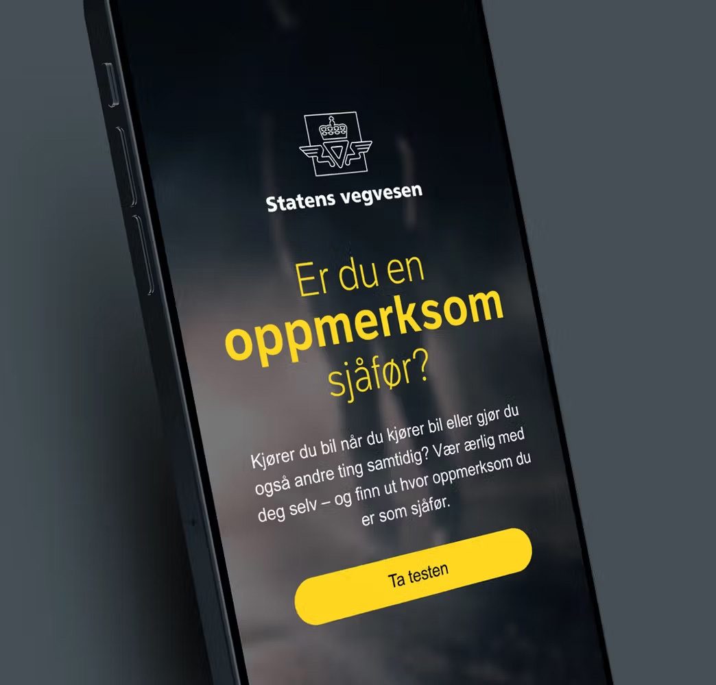 Smartphone showing a Norwegian Public Roads app: 'Are you an attentive driver?' test.
