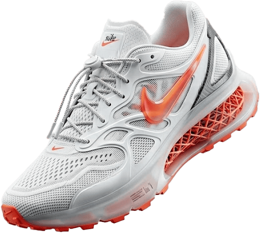White Nike running shoe with vibrant orange accents, including a prominent swoosh and unique lattice midsole.