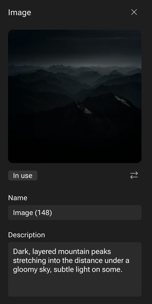 Dark, layered mountains under a gloomy sky with subtle light on peaks.