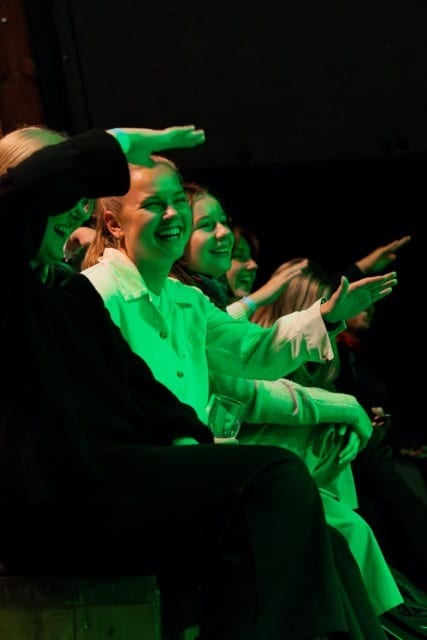 Performing arts, Microphone, Entertainment, Hat, Gesture, Smile, Music