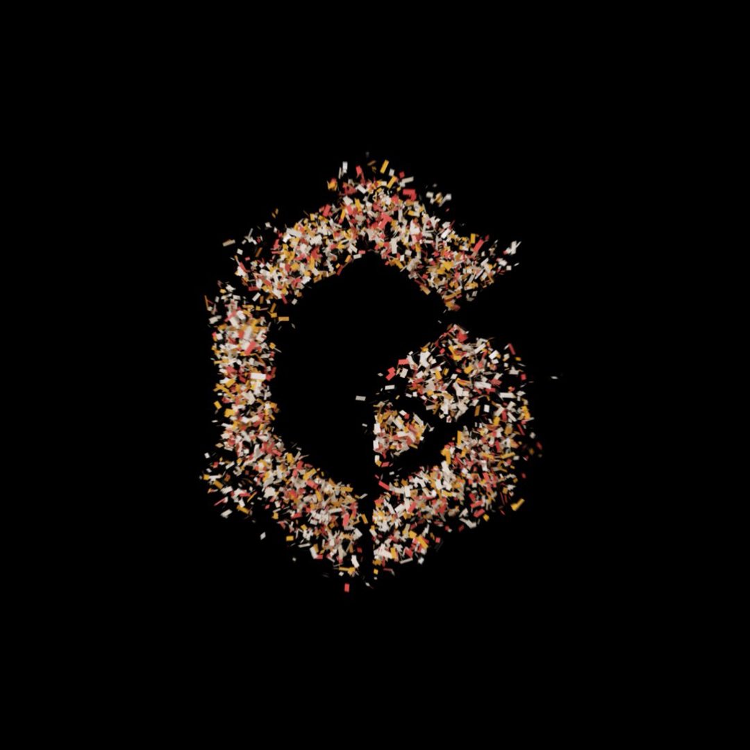 Letter G made of multi-colored confetti on a black background.